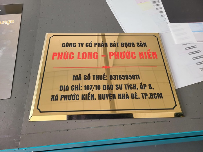 bảng hiệu công ty inox in uv